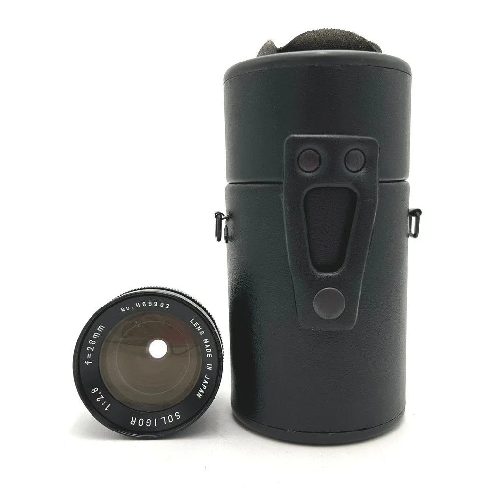 Soligor 28mm f2.8 Wide Angle Lens Japan H69902 with Braun Cap and Case
